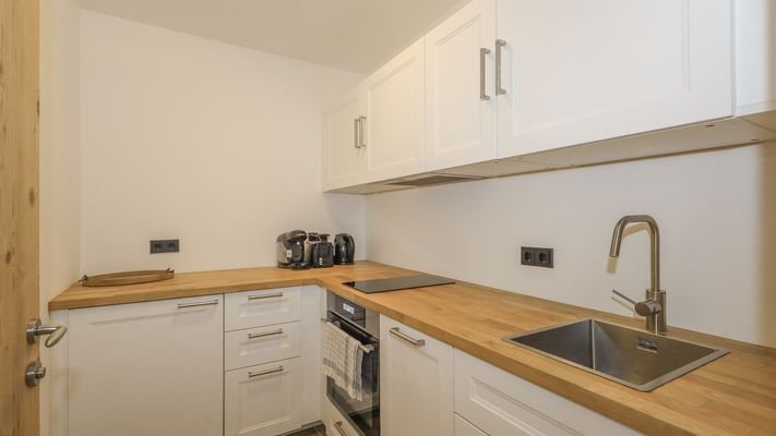 KITZIMMO-Garten Apartment mit touristischer Widmung kaufen - Immobilien Kitzbühel.