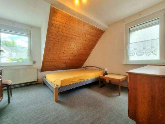 Eines der kuscheligen Schlaf- oder Kinderzimmer