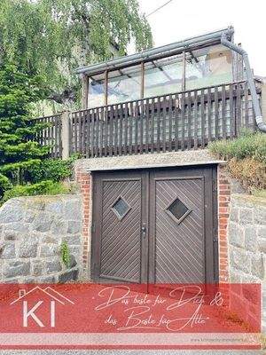 Garage, darüber Laube