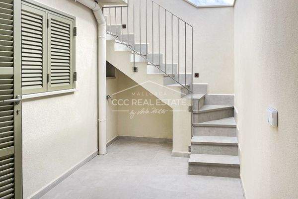 Terrasse mit Hauswirtschaftsraum