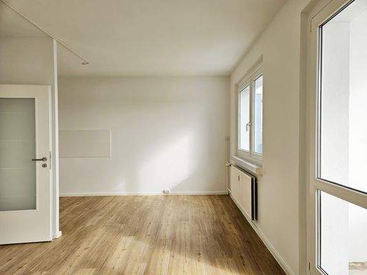 Wohnzimmer mit offener Küche.jpg