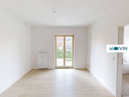 Ansicht II: Wohn- und Esszimmer mit offenem Küchenbereich