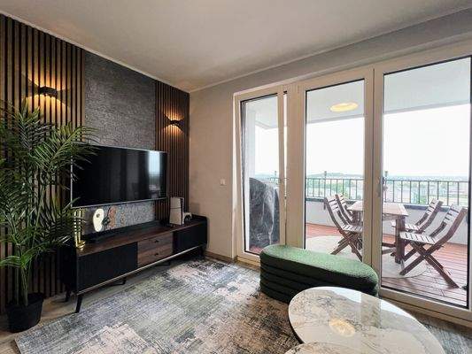 Wohnzimmer mit großer Loggia