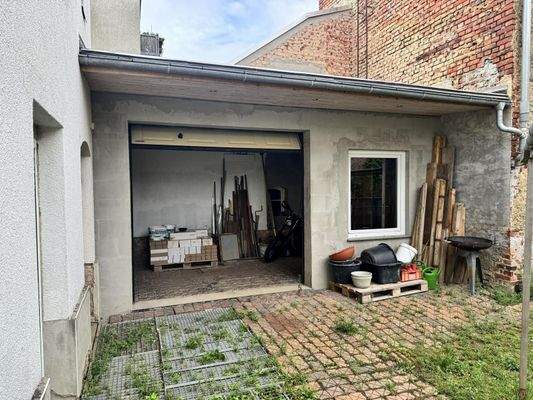 Zugang Garten mit Elektr. Rolltor