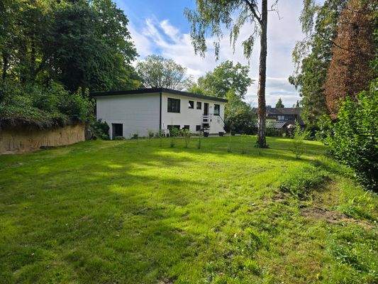 Maison Immobilien Bungalow Buchholz Ansicht Seite Eingang  von Einfahrt