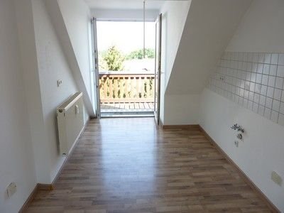 - Dachgeschosswohnung mit Balkon -