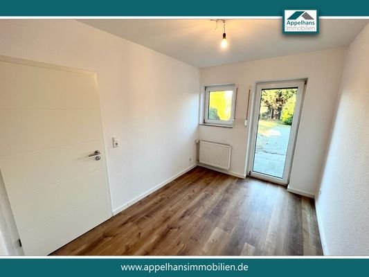 Arbeitsbereich/Garderobe/Spielzimmer