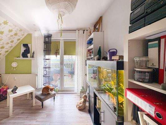 Schlafzimmer mit Zugang zur Dachterrasse