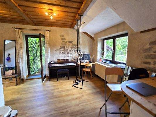 Gemütlicher Wohnbereich der Wohnung OG rechts