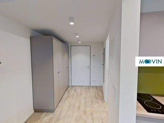 Ansicht VI: Wohn- und Schlafzimmer mit offenem Küchenbereich