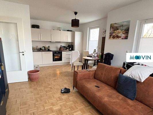 Ansicht I: Wohn- und Esszimmer mit offenem Küchenbereich