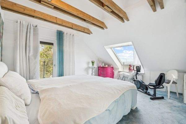Schlafzimmer mit Ausgang zur Dachterrasse