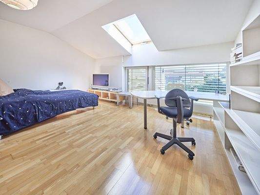 Schlafzimmer mit Dachfenster