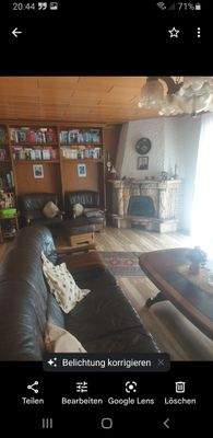 Wohnzimmer mit Kamin 