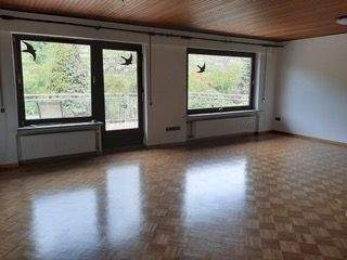 Wohnzimmer mit Blick Terrasse.jpeg