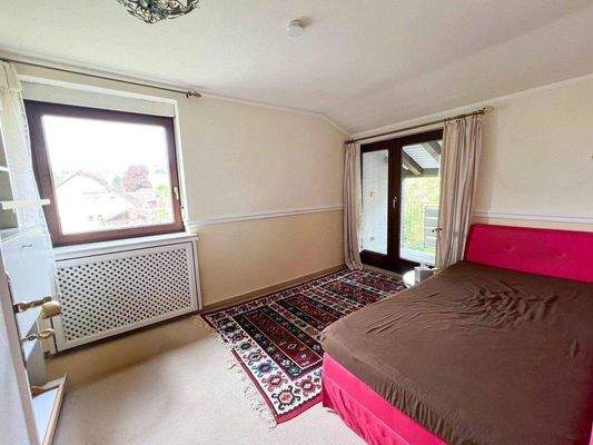 Schlafzimmer mit Balkon