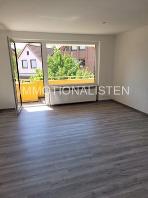 Wohnzimmer mit Balkon