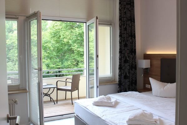 Schlafzimmer mit Balkon