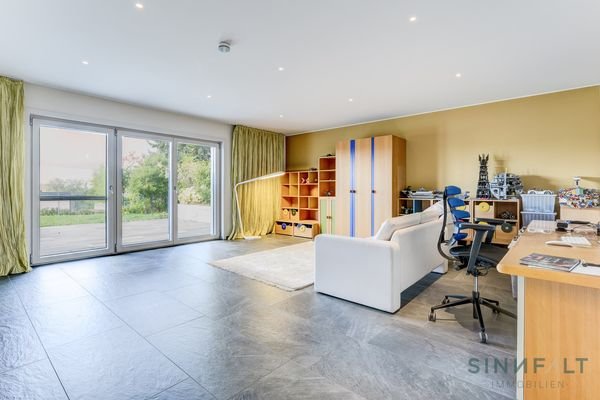 Studio im Untergeschoss mit Ausgang zur Nordwest Terrasse 