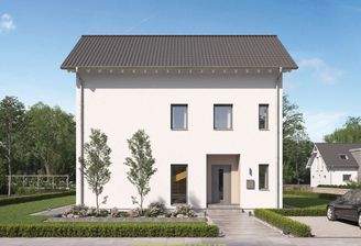 Dieses massa haus Fertighaus Einfamilienhaus im Lifestyle-Design präsentiert sich bei Tageslicht mit
