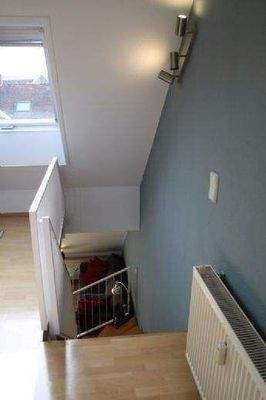 Treppenaufgang ins Galleriegeschoß