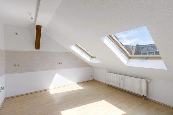 Wohnzimmer mit offener Küche 