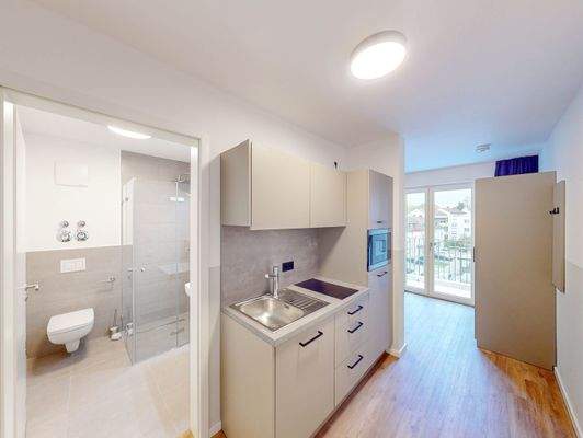 Eingangsbereich mit offener Küche