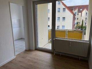 Wohnzimmer mit Balkon