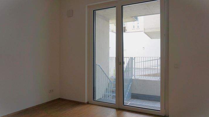 Wohnzimmer mit Ausgang auf die Terrasse