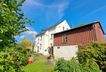 Wohn-und Geschäftshaus Rückansicht gartenseitig mit Scheune
