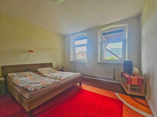 Schlafzimmer im Erdgeschoss, Bild 1