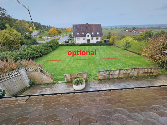 24_Blick auf den Garten aus dem Obergeschoss_mit optionalem Garten.png