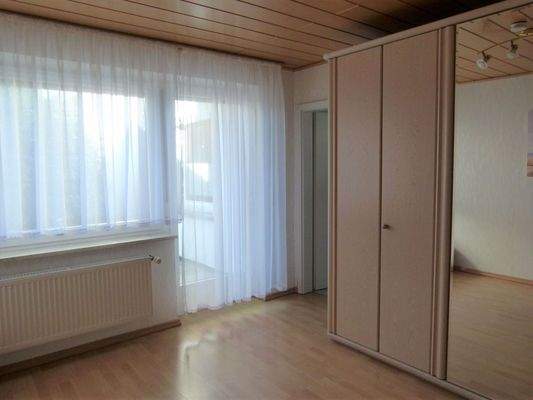 Schlafzimmer mit Terrassenzug.