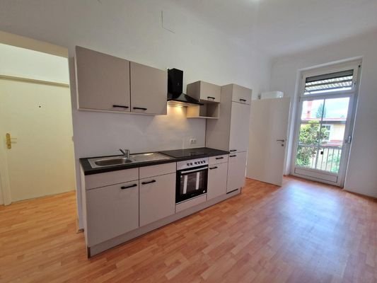Küchen-/Essbereich (ca. 14,5 m²) mit Balkonzugang 