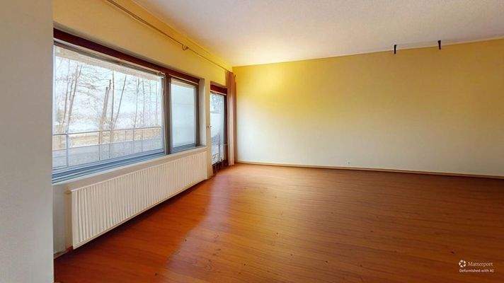 40B-Am-Strand-Living-Room-Defurnished 1