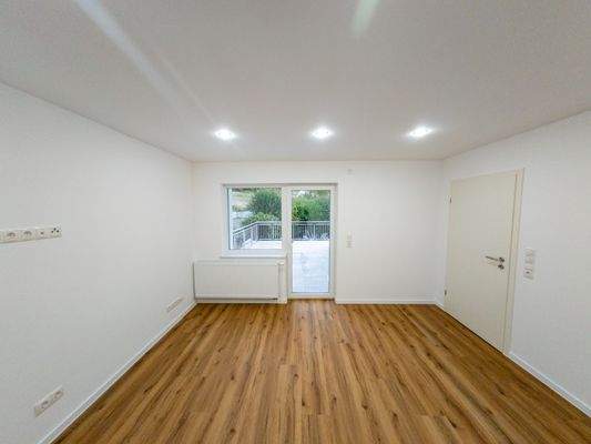 Wohnzimmer mit große Terasse