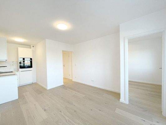 Blick durch das Wohnzimmer in Richtung Schlafzimmer