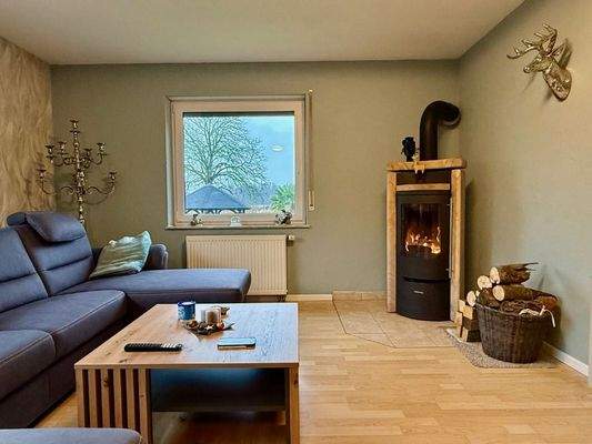 Wohnzimmer mit Kamin