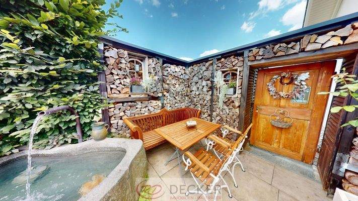 Gartenecke mit Brunnen