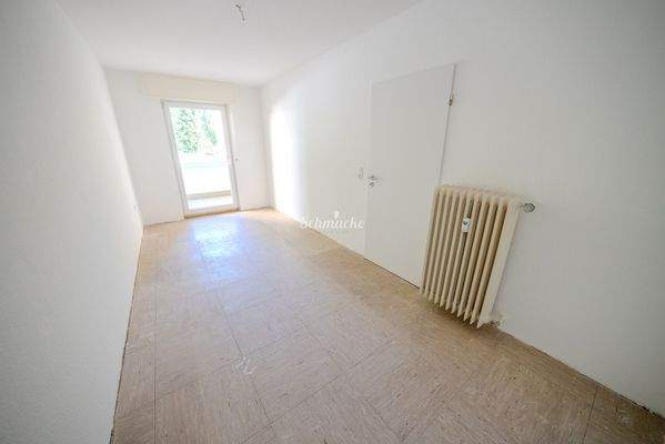 Schlafzimmer mit Ausgang zum Balkon