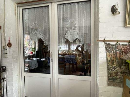 Tür zur überdachter Terrasse 