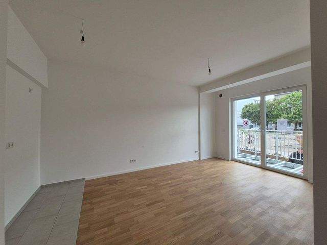 Schicke 2-Zimmerwhg. mit Parkett, vollwertige EBK, Balkon u. Fußbodenheizung, Belüftungsanlage - Foto 1