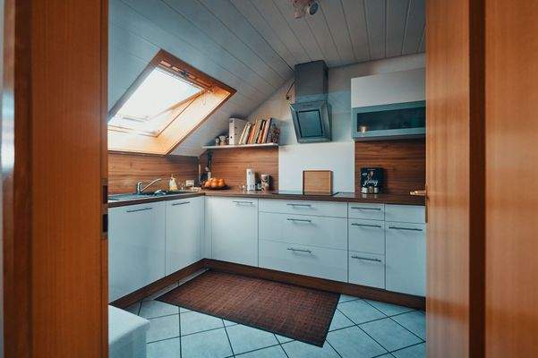 Küche mit Einbauküche 