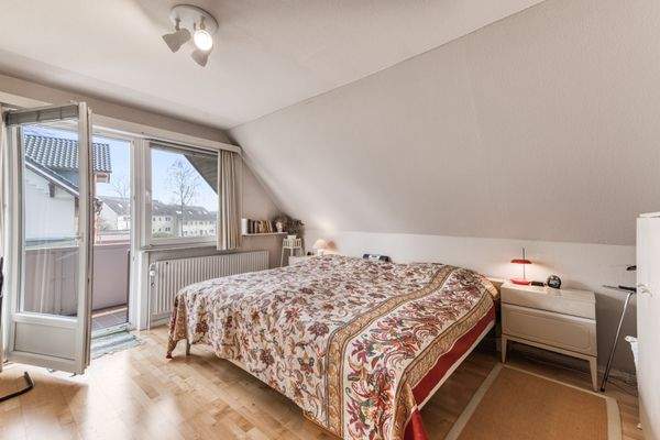 Schlafzimmer mit Balkon