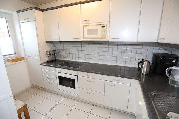 Küche mit Einbauküche