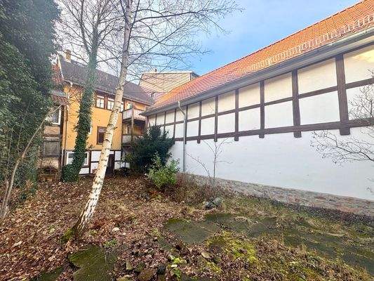 Rückansicht Immobilie 3 - Burgstraße 51 + Garagenkomplex mit Ausbaureserve