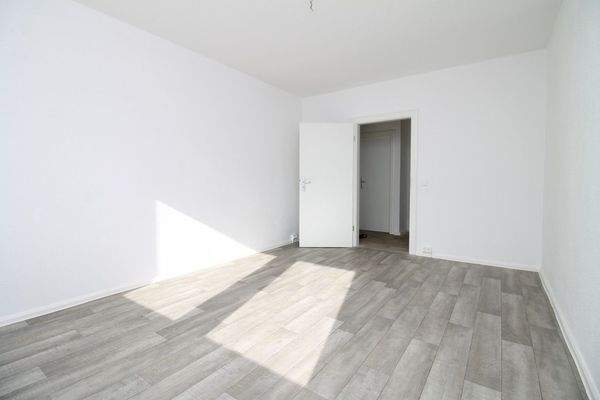 Wohnzimmer mit Balkon