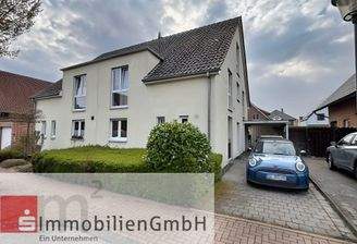 Einfahrt mit Carport