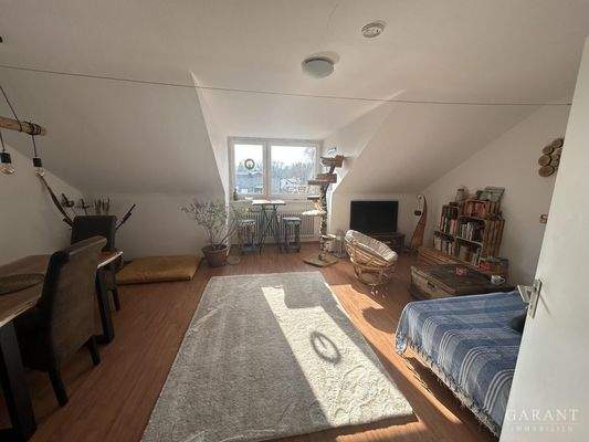 Wohnzimmer mit Dachgaube