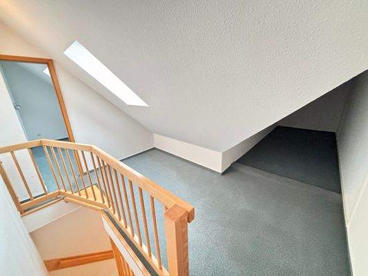 Treppe ins Obergeschoss
